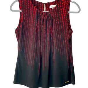 Flattering fit with gold details. Bright red and black.